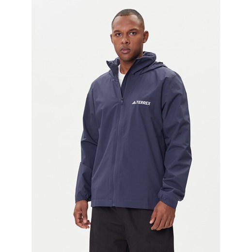 adidas Kurtka przeciwdeszczowa Multi Essentials 2L Rain JY0477 Pomarańczowy Regular Fit ze sklepu MODIVO w kategorii Kurtki męskie - zdjęcie 185870675