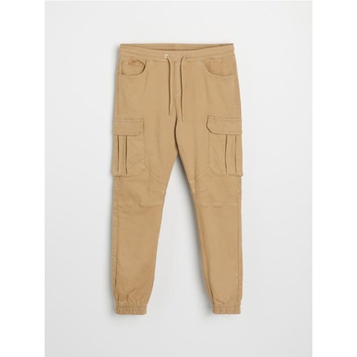 Sinsay - Jeansy regular jogger cargo - żółty - id: 452FB-18X - marki Sinsay - 185894887 Sinsay - Jeansy regular jogger cargo - żółty ze sklepu Sinsay w kategorii Spodnie męskie - zdjęcie 185894887