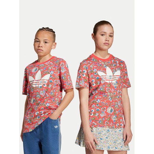 adidas T-Shirt Liberty London JV7817 Czerwony Loose Fit ze sklepu MODIVO w kategorii Bluzki dziewczęce - zdjęcie 185913335