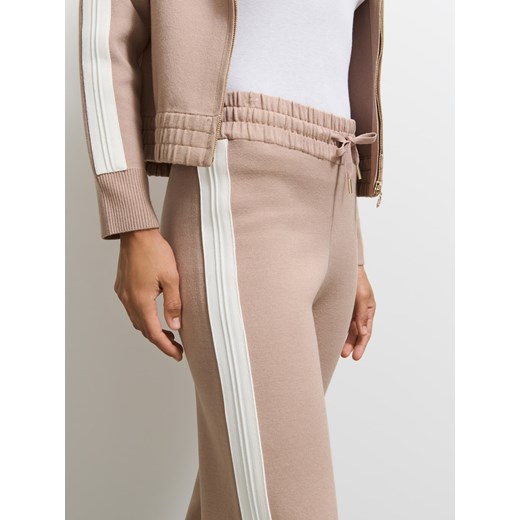 Mohito - Spodnie dresowe - beżowy Mohito L Mohito