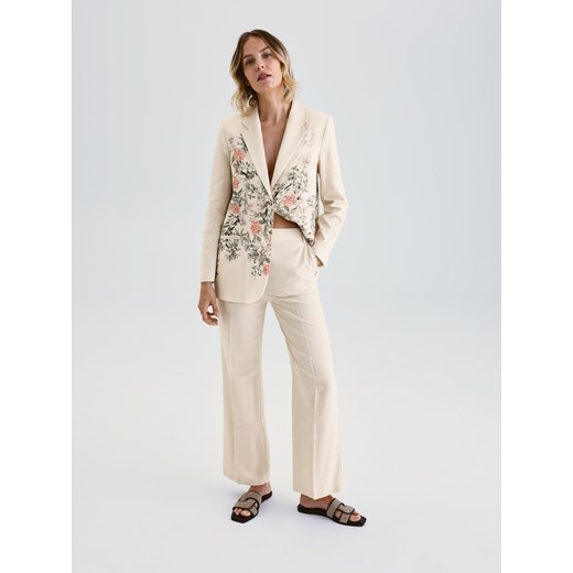 Reserved - Garniturowe spodnie z dodatkiem lnu - złamana biel ze sklepu Reserved w kategorii Spodnie damskie - zdjęcie 185933486