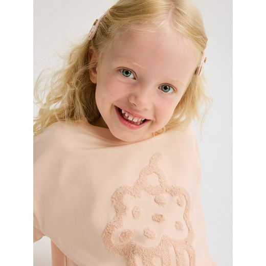 Reserved - Koszulka z aplikacją - pastelowy róż ze sklepu Reserved w kategorii Bluzki dziewczęce - zdjęcie 185936286