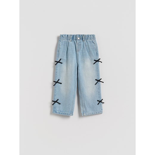 Reserved - Jeansy baggy z kokardkami - niebieski ze sklepu Reserved w kategorii Spodnie dziewczęce - zdjęcie 185941828