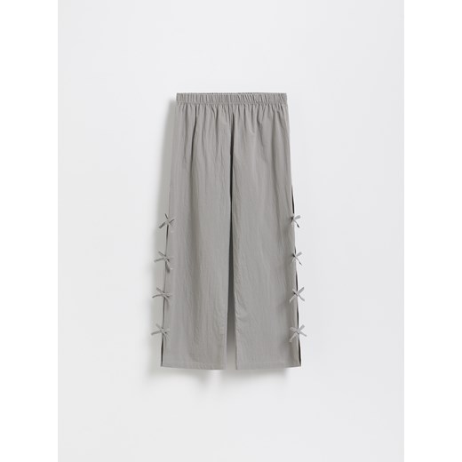 Reserved - Spodnie z wiązaniem na nogawkach - ciemnoszary ze sklepu Reserved w kategorii Spodnie dziewczęce - zdjęcie 185944367
