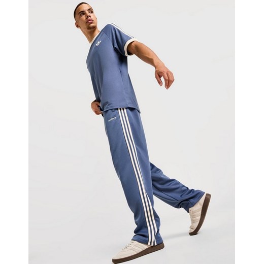 ADIDAS SPODNIE FIRST PANT ze sklepu JD Sports  w kategorii Spodnie męskie - zdjęcie 185981518