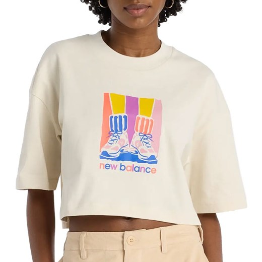 Koszulka damska New Balance WT53904LIN - beżowa ze sklepu streetstyle24.pl w kategorii Bluzki damskie - zdjęcie 185994477