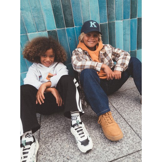 Reserved - Sportowe sneakersy - złamana biel ze sklepu Reserved w kategorii Buty sportowe dziecięce - zdjęcie 186001576