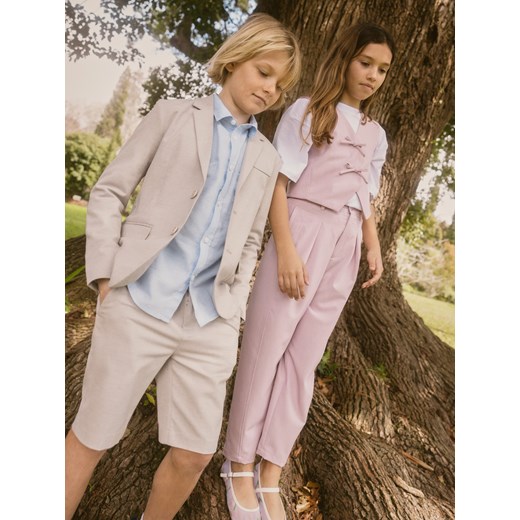 Reserved - Eleganckie spodnie z wiskozą - różowy ze sklepu Reserved w kategorii Spodnie dziewczęce - zdjęcie 186002215