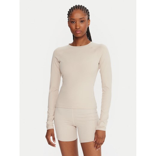 Reebok Koszulka techniczna Reebok X Ewa Chodakowska RK25316CCW Beżowy Slim Fit ze sklepu MODIVO w kategorii Bluzki damskie - zdjęcie 186028918