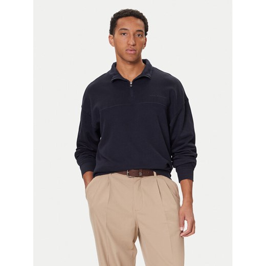 Tommy Hilfiger Bluza UM0UM03626 Granatowy Regular Fit ze sklepu MODIVO w kategorii Bluzy męskie - zdjęcie 186029666