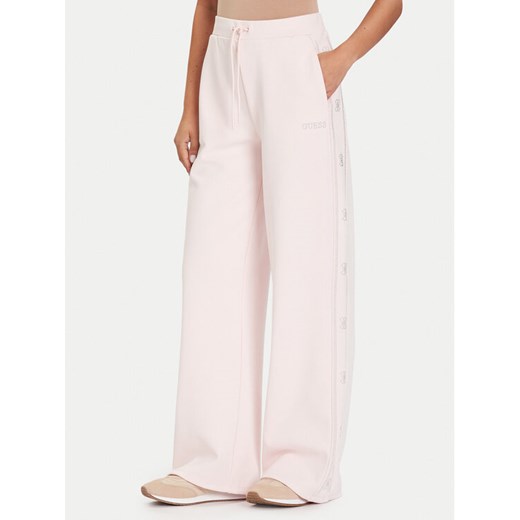 Guess Spodnie dresowe V5BB12 KCX22 Różowy Wide Leg ze sklepu MODIVO w kategorii Spodnie damskie - zdjęcie 186029878