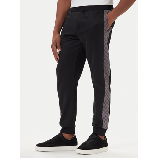 JOOP! Spodnie dresowe 17 JJ-48Ionnito 30049571 Czarny Regular Fit ze sklepu MODIVO w kategorii Spodnie męskie - zdjęcie 186030406