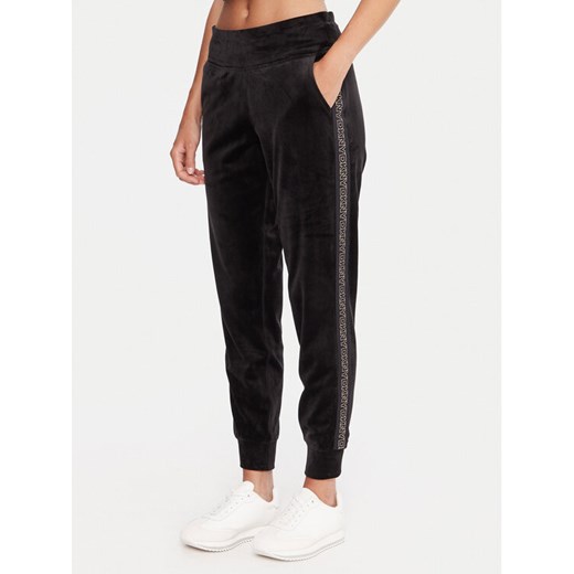 DKNY Sport Spodnie dresowe DP5P3706 Czarny Regular Fit ze sklepu MODIVO w kategorii Spodnie damskie - zdjęcie 186031045
