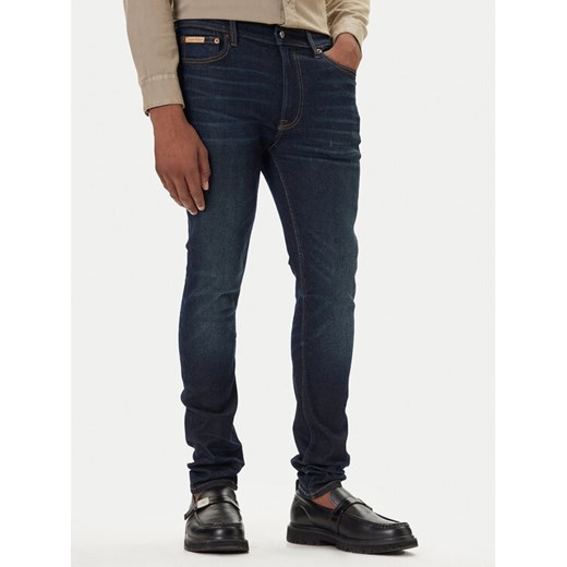 Calvin Klein Jeans Jeansy LV04RD718G Granatowy Skinny Fit ze sklepu MODIVO w kategorii Jeansy męskie - zdjęcie 186032976