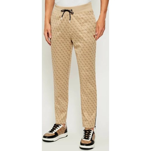 GUESS ACTIVE Spodnie dresowe KORBIN | Regular Fit - id: GV255M000001M46 - marki Guess - 186067885 GUESS ACTIVE Spodnie dresowe KORBIN | Regular Fit ze sklepu Gomez Fashion Store w kategorii Spodnie męskie - zdjęcie 186067885