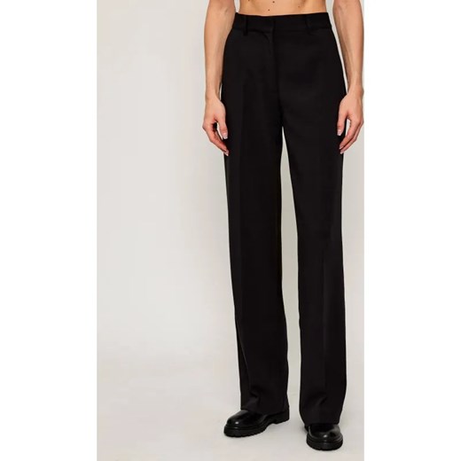 GUESS Spodnie JOANDRA | Relaxed fit ze sklepu Gomez Fashion Store w kategorii Spodnie damskie - zdjęcie 186067945