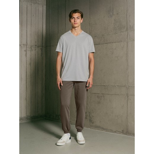 Sinsay - Spodnie dresowe ze ściągaczami - brązowy Sinsay L Sinsay