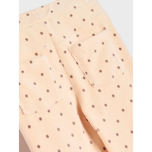 Sinsay - Prążkowane spodnie flare - kremowy Sinsay 122 (6-7 l) Sinsay