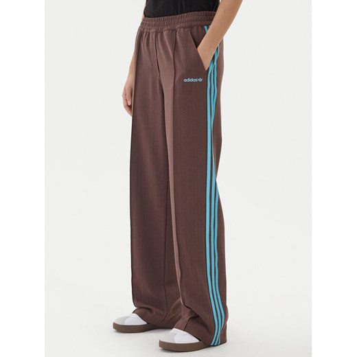 adidas Spodnie dresowe JX5308 Brązowy Regular Fit XS MODIVO