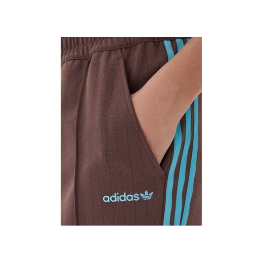 adidas Spodnie dresowe JX5308 Brązowy Regular Fit M MODIVO