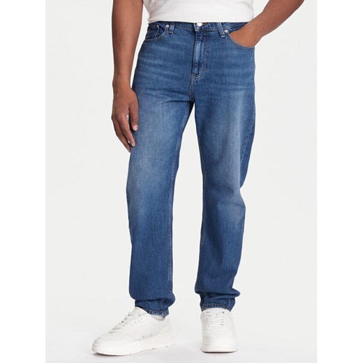 Tommy Jeans Jeansy DM0DM20191 Niebieski Regular Fit ze sklepu MODIVO w kategorii Jeansy męskie - zdjęcie 186167427