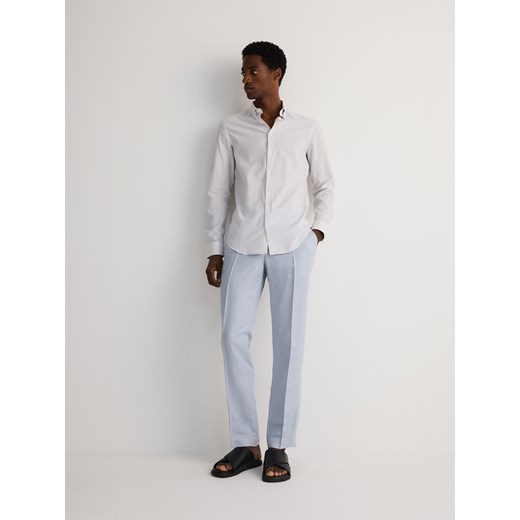 Reserved - Spodnie garniturowe z domieszką lnu - jasnoniebieski ze sklepu Reserved w kategorii Spodnie męskie - zdjęcie 186170275