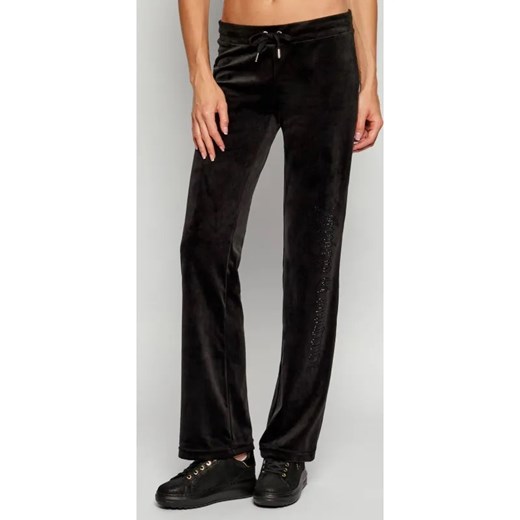 Juicy Couture Spodnie dresowe CHRISTINE | flare fit ze sklepu Gomez Fashion Store w kategorii Spodnie damskie - zdjęcie 186176315