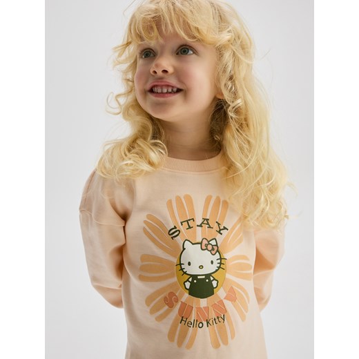 Reserved - Bluzka z nadrukiem Hello Kitty - brzoskwiniowy ze sklepu Reserved w kategorii Bluzki dziewczęce - zdjęcie 186177485