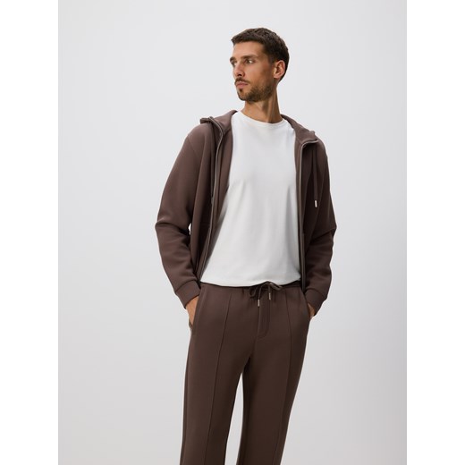 Reserved - Spodnie dresowe slim fit - beżowy ze sklepu Reserved w kategorii Spodnie męskie - zdjęcie 186183656