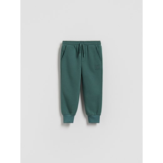 Reserved - Dresowe joggery - morski ze sklepu Reserved w kategorii Spodnie chłopięce - zdjęcie 186188087