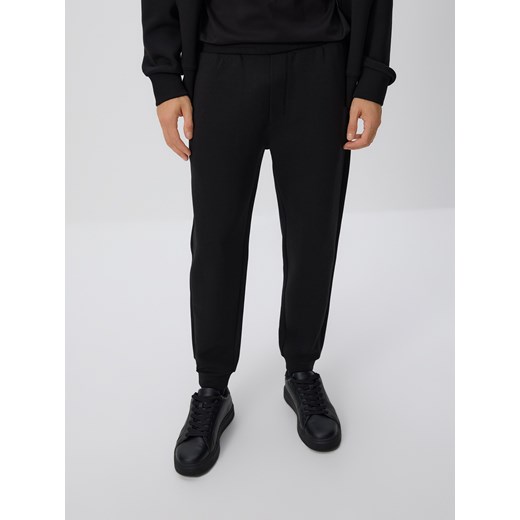 Reserved - Spodnie dresowe slim fit - czarny ze sklepu Reserved w kategorii Spodnie męskie - zdjęcie 186190058