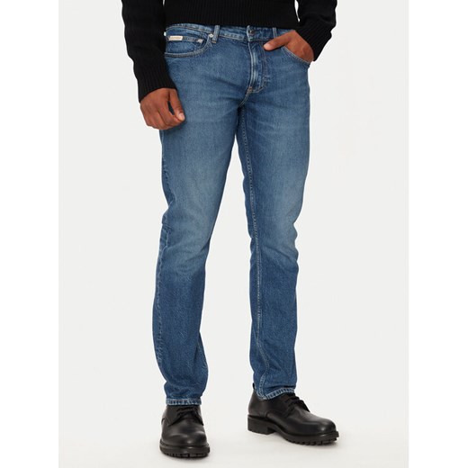 Calvin Klein Jeans Jeansy J30J326359 Niebieski Slim Fit ze sklepu MODIVO w kategorii Jeansy męskie - zdjęcie 186200557