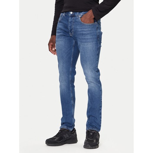 Tommy Jeans Jeansy DM0DM22168 Niebieski Regular Fit ze sklepu MODIVO w kategorii Jeansy męskie - zdjęcie 186205909