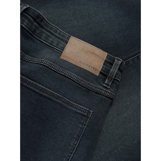 Reserved - Jeansy slim fit z efektem sprania - granatowy Reserved 33 Reserved