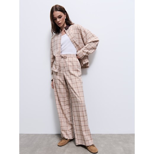 Mohito - Spodnie w kratę - beżowy ze sklepu Mohito w kategorii Spodnie damskie - zdjęcie 186224245