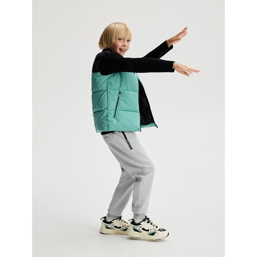 Reserved - Pikowana kamizelka z kieszeniami - morski ze sklepu Reserved w kategorii Kamizelki chłopięce - zdjęcie 186228575