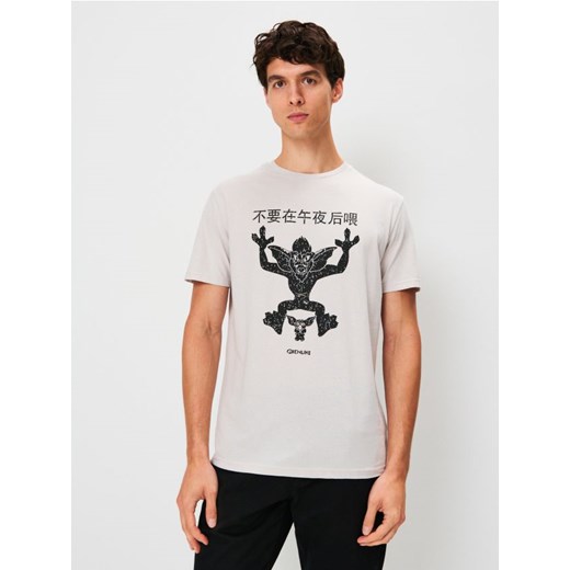 Sinsay - Bawełniana koszulka z nadrukiem Gremlins - kremowy ze sklepu Sinsay w kategorii T-shirty męskie - zdjęcie 186231486