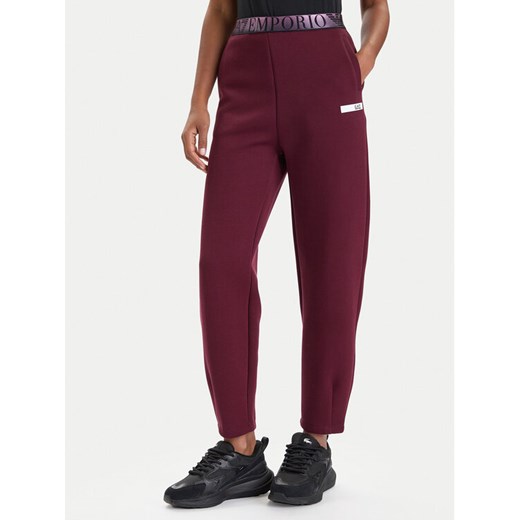 EA7 Emporio Armani Spodnie dresowe 7W000678 AF13151 M5064 Bordowy Regular Fit ze sklepu MODIVO w kategorii Spodnie damskie - zdjęcie 186233909