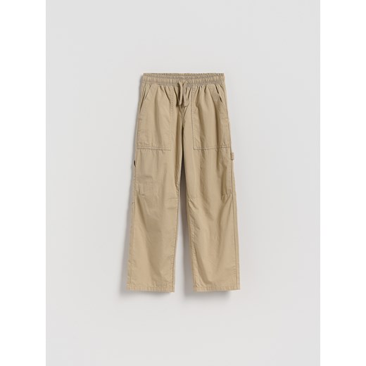 Reserved - Bawełniane spodnie parachute - beżowy ze sklepu Reserved w kategorii Spodnie chłopięce - zdjęcie 186254065