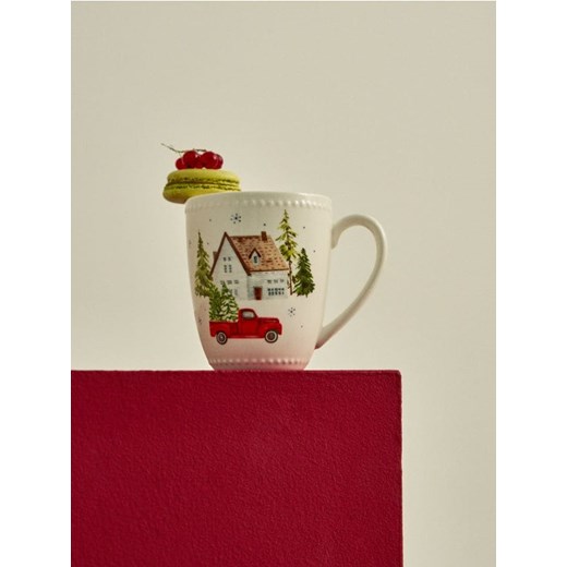 Sinsay - Ceramiczny kubek z uchem z motywem świątecznym - biały - id: 052GI-00X - marki Sinsay - 186277458 Sinsay - Ceramiczny kubek z uchem z motywem świątecznym - biały ze sklepu Sinsay w kategorii Kubki - zdjęcie 186277458