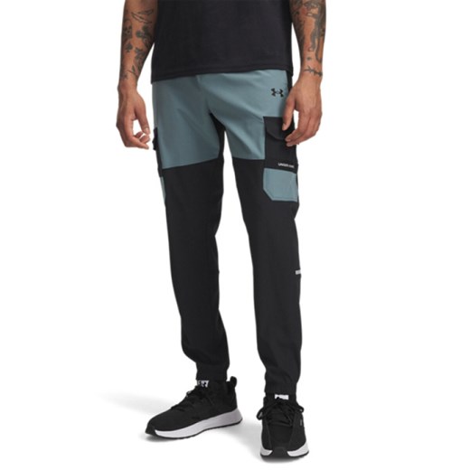Męskie spodnie treningowe Under Armour UA Tech Utility Woven - czarne ze sklepu Sportstylestory.com w kategorii Spodnie męskie - zdjęcie 186288468