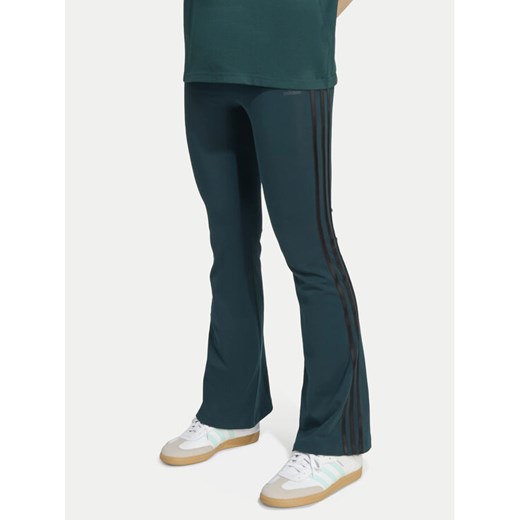 adidas Legginsy adicolor JV8617 Zielony Slim Fit ze sklepu MODIVO w kategorii Spodnie dziewczęce - zdjęcie 186345456