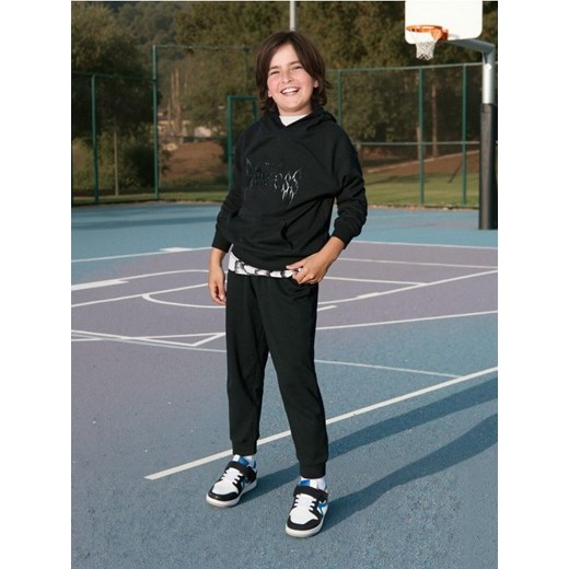 Sinsay - Spodnie jogger ze ściągaczami - czarny - id: 438DN-99X - marki Sinsay - 186385745 Sinsay - Spodnie jogger ze ściągaczami - czarny ze sklepu Sinsay w kategorii Spodnie chłopięce - zdjęcie 186385745