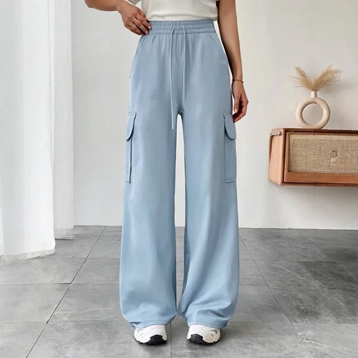 Błękitne dresy damskie z kieszeniami - Niebieski S ze sklepu Intimica.pl w kategorii Spodnie damskie - zdjęcie 186415118