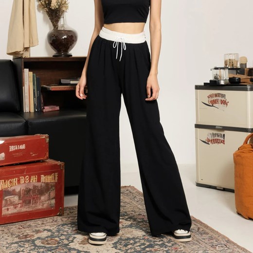 Czarno-białe spodnie dresowe damskie - Czarny XS ze sklepu Intimica.pl w kategorii Spodnie damskie - zdjęcie 186415856