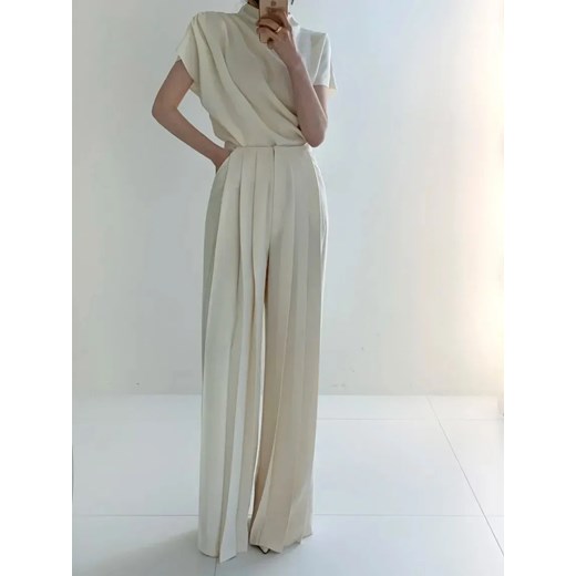 Plisowane damskie spodnie z wysokim stanem - Kremowy S ze sklepu Intimica.pl w kategorii Spodnie damskie - zdjęcie 186421769