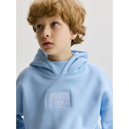 Reserved - Bawełniana bluza z naszywką - jasnoniebieski Reserved 122 (6-7 lat) Reserved