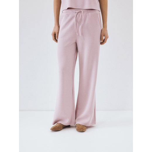 Reserved - Spodnie dresowe z modalem - pastelowy róż Reserved XS wyprzedaż Reserved