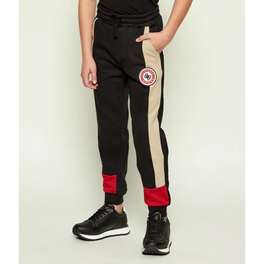 Guess Spodnie dresowe | Regular Fit ze sklepu Gomez Fashion Store w kategorii Spodnie chłopięce - zdjęcie 186460046