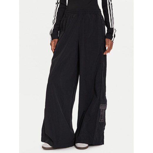adidas Spodnie dresowe Adibreak adicolor Adilenium JV7486 Czarny Oversize ze sklepu MODIVO w kategorii Spodnie damskie - zdjęcie 186498916